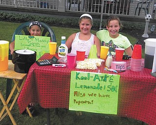 At the end of the summer Lilly Donatelli, Sarah Kinderdine and Madalyn Smith offer beverages and popcorn to help beat the heat. They are friends from West Blvd. School in Boardman. Sent in by Madalyn’s Nana Patty Hoover.