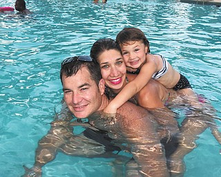 Brenda Fusek sent this picture of her son, Michael Fusek III, her daughter-in-law, Laura, and her granddaughter, Taylor Elizabeth, 3 1/2, while they are basking in the cool water while vacationing in Fort Lauderdale, Fla.