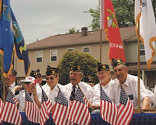 Austintown veterans are smiling while riding in the July 4 parade in Austintown. Sent by Laurie Fox of Lowellville.