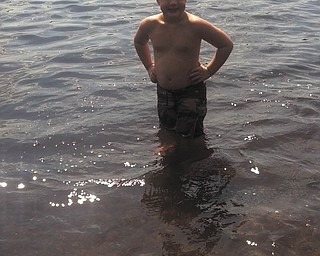 Dane Michael Duvall, grandson of John and Regina LoCicero of New Waterford, is all smiles while cooling off in the water. Sent by his grandmother.