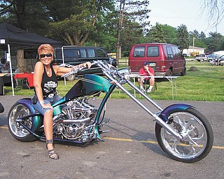 Nothing better than a custom bike and a warm night for the local bike night! "Now that's a vacation," says Kelly Morocco at an Ice House Bike Night.