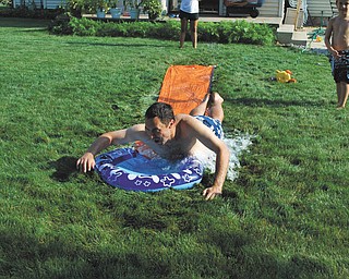 David Buttar of Niles trying to keep up with his son, Jacob! Sent by Rose Marsco.