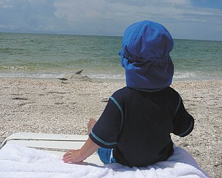 Nico Gentile of Salem, catching some rays while watching the birds in Naples, Fla. Sent by Nick and Andrea Gentile.