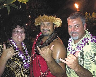 Ray and Mary Lukach enjoy a luau while on vacation in Hawaii.