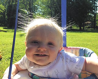 Logan Cheney of Liberty all smiles as he swings in his backyard. Sent by his parents Jason and Amanda.