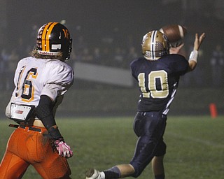 . ROBERT K. YOSAY | THE VINDICATOR..One handed catch for a TD #10 Van Vanover as #16 Wellsville Jordan Allenn..Poland vs Struthers @ Poland