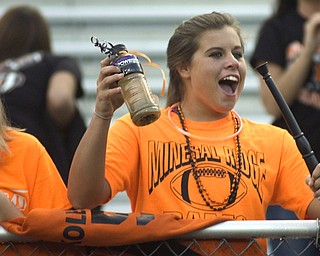 Kelli Cardinal/The Vindicator .Darby Kolesar, a junior at Mineral Ridge, cheers for the Rams at their game Friday against McDonald at Whittaker Field.