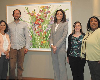 SPECIAL TO THE VINDICATOR: Committee members of the “Watercolors at the Gardens — An Evening with Gary Bukovnik” event are, from left, Janey Donadee, co-chair; Adam Lee of The Sprouted Table; Katie Ann Heddaeus; Mandy Smith and Madonna Pinkard. They are standing in front of Bukovnik’s watercolor “Joy.”