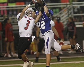 . ROBERT K. YOSAY | THE VINDICATOR..Interception as Polands #12 Tyler Smith takes the pass away from Struthers #3 Dalton Moore .during second quarter action..Poland vs Struthers @ Poland