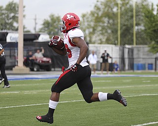 Youngstown State's Martin Ruiz (29) runs , untouched, for a touchdown on Youngstown State's first offensive play of the game during the first quarter of Saturday nights matchup at Indiana State University in Terre Haute, Indiana. Dustin Livesay | The Vindicator 10/05/13 Indiana State University.