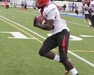 Youngstown State's Jameel Smith (26) looks for blockers after intercepting the ball during the first quarter of Saturday nights matchup at Indiana State University in Terre Haute, Indiana. Smith returned the interception 95 yards for a touchdown. Dustin Livesay | The Vindicator 10/05/13 Indiana State University.