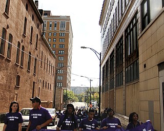 MADELYN P. HASTINGS | THE VINDICATOR..Students of the Sojourner to the Past group led in a parade to kick off nonviolence week in downtown Youngstown on Sunday, October 6, 2013..... - -30-..