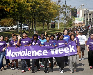 MADELYN P. HASTINGS | THE VINDICATOR..Students of the Sojourner to the Past group led in a parade to kick off nonviolence week in downtown Youngstown on Sunday, October 6, 2013.... - -30-..