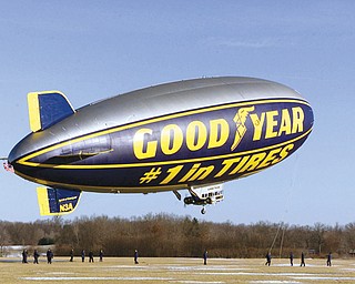 The Goodyear Tire and Rubber Co. blimp Spirit of Goodyear lifts off from the company’s Winged Foot Lake facility in Suffield, Ohio, during its first day of flight testing. Like many elderly Ohioans, the Spirit of Goodyear is retiring to Florida. The 13-year-old airship will make its final departure from Akron on Friday and will fly out of Goodyear’s Pompano Beach dock until it is decommissioned next year.
