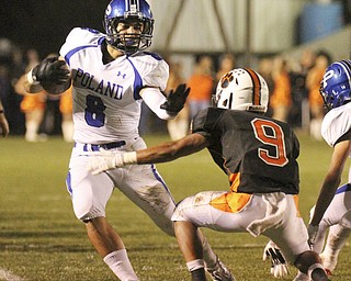William d. Lewis The Vindicator Howland's Tre Bryarly(9) tries to stop Poland's George Chammas(8) during 10-11-13 game at Howland.