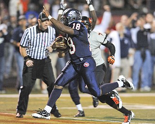 Fitch #18 Antwan Harris sprints into the the end zone to score a touchdown after getting past Massillon #7 Reggie Rogers.