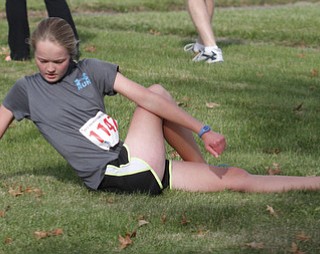 . ROBERT K. YOSAY | THE VINDICATOR..pretzel stretch ?? Nadya Stratton of Boardman (ok) stretches before the race.....The 39th Annual Peace Race - with over 2000 runners on a beautiful October day