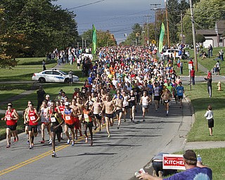 . ROBERT K. YOSAY | THE VINDICATOR..And they are off as the runners head east on Kirk Rd...The 39th Annual Peace Race - with over 2000 runners on a beautiful October day
