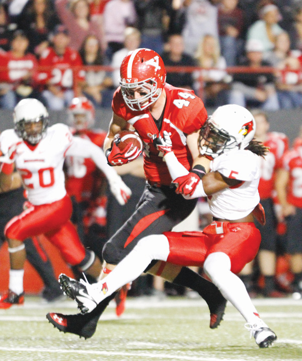 YSU tight end Nate Adams is corralled by Illinois State’s Tevin Allen after catching a 27-yard pass for a first down in Saturday’s 59-21 win at Stambaugh Stadium. This weekend, Western Illinois will try to disarm the Penguins’ arsenal of weapons.