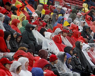MADELYN P. HASTINGS | THE VINDICATOR..Visitors prepare for a rainy homecoming game at Stambaugh Stadium on October 19, 2013.... - -30-..