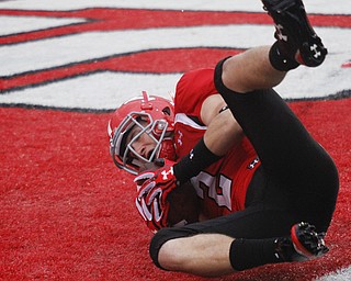 MADELYN P. HASTINGS | THE VINDICATOR..YSU's Christian Bryan (2) scores a touchdown during Youngstown's homecoming game against Western Illinois on October 19, 2013.... - -30-..