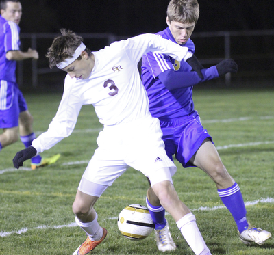 William D Lewis The Vindicator South Ranges (3) and Lake Center's (3) battle for the ball during  Tuesday action at SR.