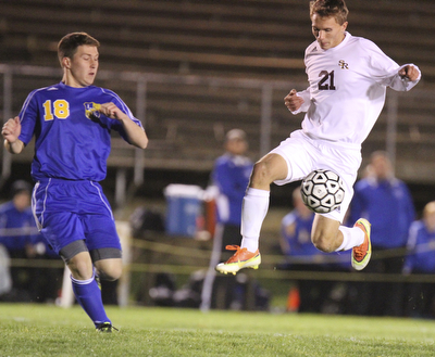 William D Lewis The Vindicator South Ranges (21) and Lake Center's (18) battle for the ball during  Tuesday action at SR.
