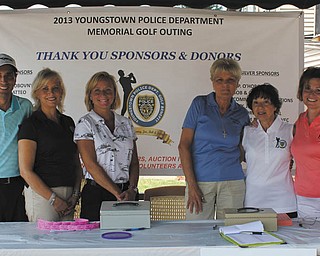 SPECIAL TO THE VINDICATOR
The Youngstown Police Department sponsored its 22nd annual Memorial Golf Outing recently  at Pine Lakes Golf Club in Hubbard. The event was in memory of those officers who lost their lives to cancer between 2009 and 2011. They are Capt. Robert Kane, Capt. Kenneth Centorame, Detective Sgt. Jerry Maietta and Detective Sgt. Joseph DeMatteo. The proceeds this year will provide Youngstown State University scholarships to Alexander Barber, son of Detective Sgt. Ronald Barber; Christopher Kenney, son of Officer Ed Kenney; Marc Ruse, son of Officer Ken Ruse; and Travis Williams, son of Clerk Lori Williams. Outing committee members, above, from left are Fred LoSasso, Debbie DeMatteo, Laura Brown, Vickie Maietta, Carlotta Kane and Sue Centorame. Also on the committee are Detective Sgt. John Patton, Officer Tony Tulipano, Lt. Jerry Slattery and Officer Tony Marzullo.