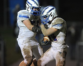 Reserve #44 Dan Zilke and #56 T.J. Henry celebrate after a Zilke touchdown run at the start of the 4th quarter.