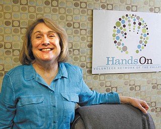 ROBERT K. YOSAY | THE VINDICATOR: Carol Ross of Boardman makes weekly calls to about a dozen elderly people as part of the Telephone Reassurance Program of HandsOn Volunteer Network of the Valley.