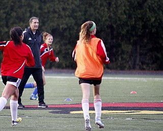MADELYN P. HASTINGS | THE VINDICATOR..Canfield boys and girls soccer coach Phil Simone coaches girls practice on October 28. Both teams are competing in regionals this week.... - -30-..