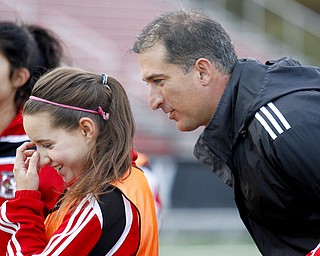 MADELYN P. HASTINGS | THE VINDICATOR..Canfield boys and girls soccer coach Phil Simone talks with sophomore player Haylee Klacik during practice on October 28. Both teams are competing in regionals this week.... - -30-..