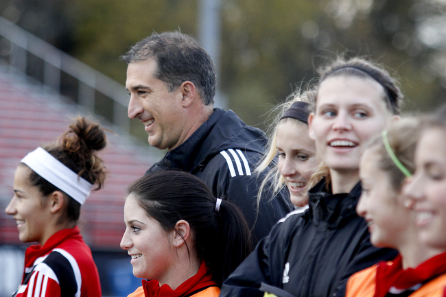 MADELYN P. HASTINGS | THE VINDICATOR..Canfield boys and girls soccer coach Phil Simone coaches girls practice on October 28. Both teams are competing in regionals this week.... - -30-..