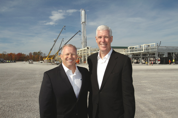 Jimmy D. Staton, left, executive vice president and CEO of Columbia Pipeline Group, and Robert C. Skaggs Jr., president and CEO of NiSource Inc., attend a dedication ceremony for the Hickory Bend plant in New Middletown.
