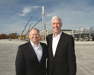 Jimmy D. Staton, left, executive vice president and CEO of Columbia Pipeline Group, and Robert C. Skaggs Jr., president and CEO of NiSource Inc., attend a dedication ceremony for the Hickory Bend plant in New Middletown.