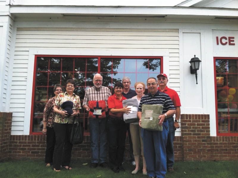 SPECIAL TO THE VINDICATOR
Members of Poland Lions Club are preparing for its Blanket of Kindness Drive from Friday through 17. From left are Lori Esasky, Monica Maholtz, Chuck Maholtz, Judy Young, Dave Rudowsky, Lori Gentile, Gerald Gentile and Paul Young.