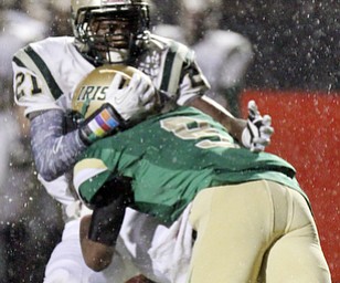 William D LEwis The Vindicator Ursuline's NOT IN BLITZ ROSTER(9) hits SVSM's Parris Campbell(1) causing a fumble during 1rst qtr action Thursday 10-31-13 at YSU.