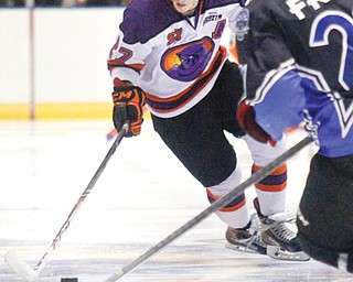 Phantoms’ Luke Stork (27) reaches for the puck against the Lincoln Stars’ Zach Frye (21) during their game
at the Covelli Centre on Oct. 19. Coming off a two-goal performance, Stork could be one of the role players challenged to assert himself as a scoring threat with Kyle Connor in Nova Scotia.