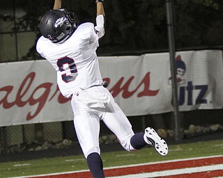 . ROBERT K. YOSAY | THE VINDICATOR..#9 Fitch Joey Harrington brings in a TD pass during second quarter action -Austintown Fitch @ Mooney at Stambaugh Stadium