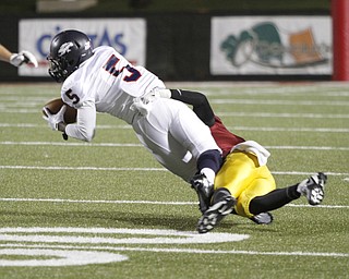 . ROBERT K. YOSAY | THE VINDICATOR..Austintown Fitch @ Mooney at Stambaugh StadiumFitchs #5 Kerrell Johnson pulls in a pass at the sidelines for a first down as Mooneys #11 Roosevelt Cooper brings him down