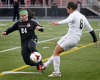 MADELYN P. HASTINGS | THE VINDICATOR..Canfield's Marissa Severino (24) and Hathaway Brown's Karoline Schenosky (6) fight for the ball during their game at Brecksville-Broadview Heights High School on November 2, 2013. ... - -30-..