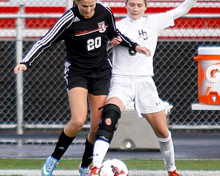MADELYN P. HASTINGS | THE VINDICATOR..Canfield's Bailey Fischer (20) and Hathaway Brown's Jordan Doak (8) fight for the ball during their game at Brecksville-Broadview Heights High School on November 2, 2013. ... - -30-..