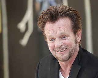 MADELYN P. HASTINGS | THE VINDICATOR..John Mellencamp discusses his painting during a reception to mark the opening of his exhibition of paintings at the Butler Museum of Art in Howland on November 2, 2013. .... - -30-..