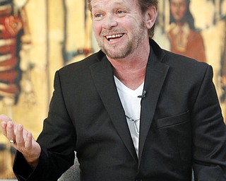 MADELYN P. HASTINGS | THE VINDICATOR..John Mellencamp discusses his painting during a reception to mark the opening of his exhibition of paintings at the Butler Museum of Art in Howland on November 2, 2013. ... - -30-..