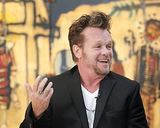 MADELYN P. HASTINGS | THE VINDICATOR..John Mellencamp discusses his painting during a reception to mark the opening of his exhibition of paintings at the Butler Museum of Art in Howland on November 2, 2013. ... - -30-..