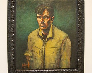 MADELYN P. HASTINGS | THE VINDICATOR..A John Mellencamp painting titled "Self with Green Background", 1993, oil on canvas, courtesy of the artist. ... - -30-..