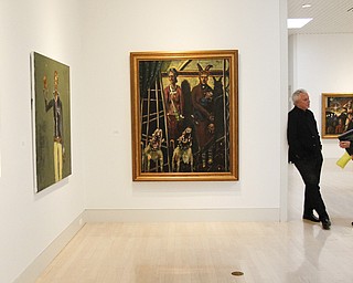MADELYN P. HASTINGS | THE VINDICATOR..(L-R) Gene Luntz, representing the artwork of John Mellencamp, and Susan Carfano, assistant director at the Butler, have a conversation before a press event on November 2, 2013 where John Mellencamp discussed his painting exhibition. ... - -30-..