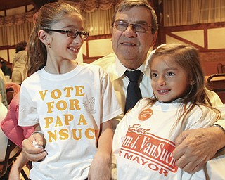 William d Lewis the Vidicator Cambell Mayor William Vansuch shares a moment with his grandaughter Brooke Bonamase, 9, left, and great graddaughter Gianna Bednarik, 6, during his election night party Teusday.