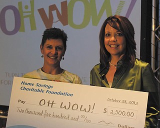 SPECIAL TO THE VINDICATOR
Home Savings Charitable Foundation has donated $5,000 to OH WOW! The Roger & Gloria Jones Children’s Center for Science & Technology. Above are Suzanne Barbati, left, executive director of OH WOW!, and Trish Mohan, branch manager of Home Savings Main Office. For information about OH WOW! call 330-744-5914 or visit www.ohwowkids.org/.