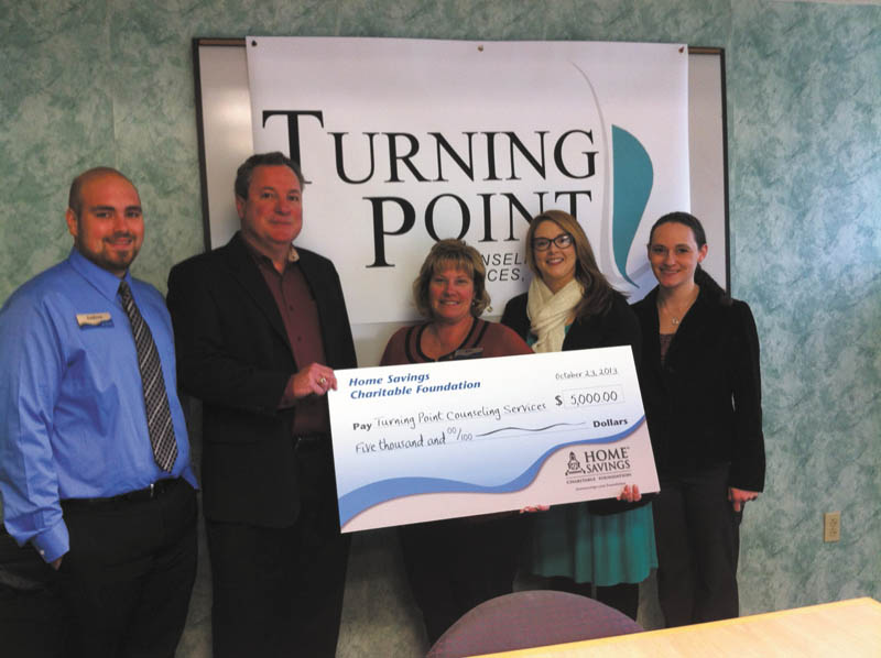 SPECIAL TO THE VINDICATOR
Home Savings Charitable Foundation recently donated $5,000 to Turning Point Counseling Services. The funds will be used for the transition to an electronic health-care records system. From left are Andrew Nemergut, personal banker, Home Savings Liberty office; Joseph A. Sylvester, executive director, Turning Point; Kim Gennaro, branch manager, Home Savings Liberty office; and Jessica Sprowl and Virginia Phillips, development specialists at Turning Point.